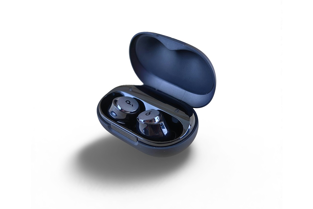 wireless earbuds black charging case product photography ai after